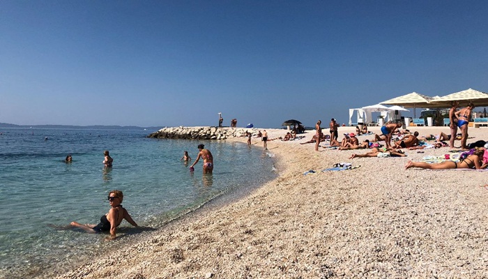Ljeto će usporiti koronu, onda slijedi drugi val