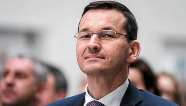 Poljski premijer: Covid-19 je bolest "poput svake druge"