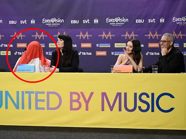 Predstavnik Holandije pokrio glavu zastavom dok je pričala Izraelka