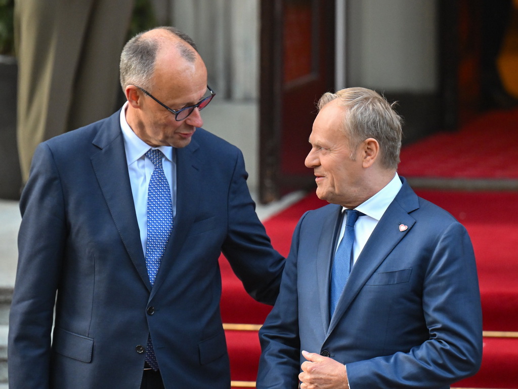 Tusk zatražio od Merza da očuva Schengen